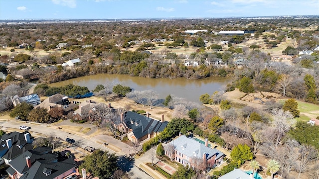 bird's eye view featuring a water view and a residential view