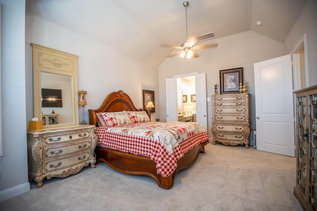 carpeted bedroom with ceiling fan, lofted ceiling, and connected bathroom