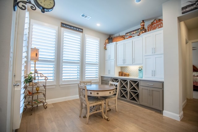 dining room with light wood-type flooring