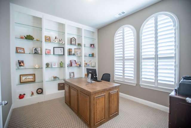 office space with light carpet