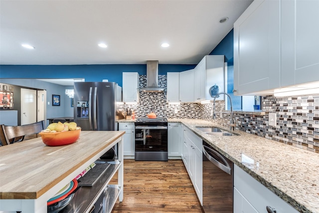 kitchen with wall chimney exhaust hood, fridge with ice dispenser, white cabinetry, stainless steel electric range oven, and dishwasher