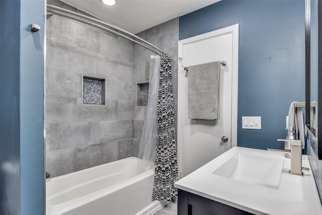 bathroom with vanity and shower / bathtub combination with curtain