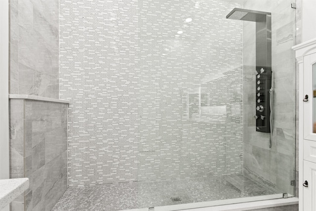 bathroom with an enclosed shower