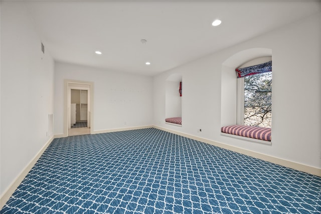 unfurnished room featuring recessed lighting, carpet flooring, visible vents, and baseboards