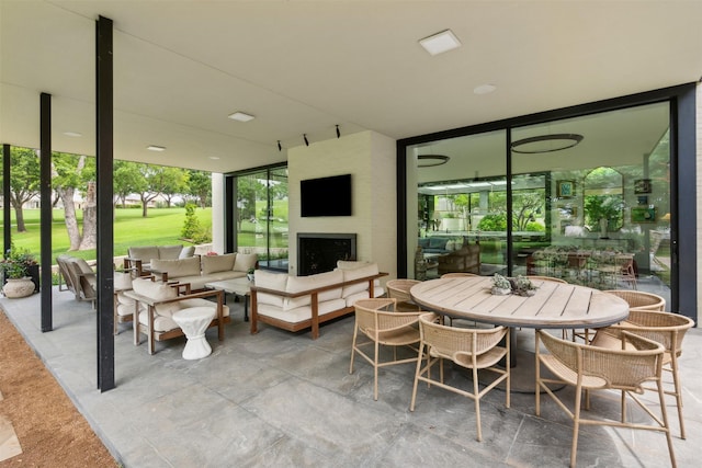 view of patio / terrace featuring outdoor dining area and outdoor lounge area