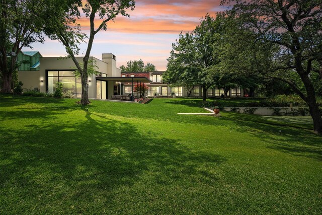 view of yard featuring an outdoor living space and a patio