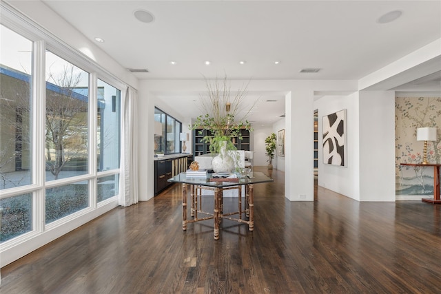 dining room with visible vents, wood finished floors, and recessed lighting