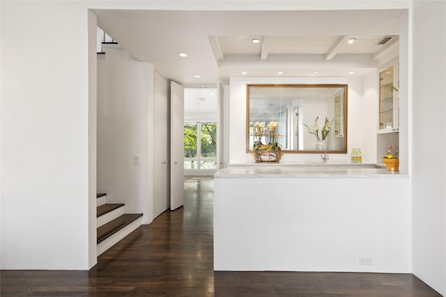 interior space featuring recessed lighting, visible vents, dark wood finished floors, and beamed ceiling