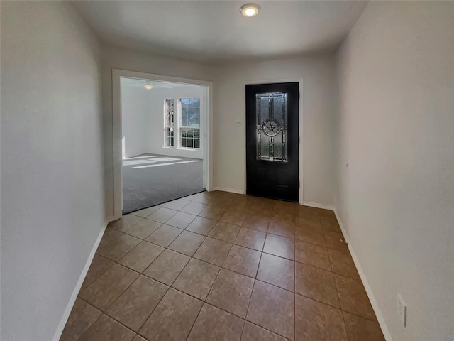 entrance foyer with tile patterned floors