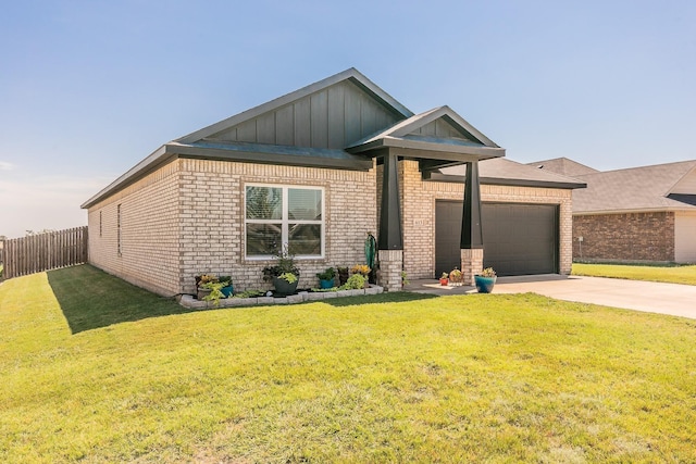 view of front of home featuring an attached garage, fence, concrete driveway, a front lawn, and board and batten siding