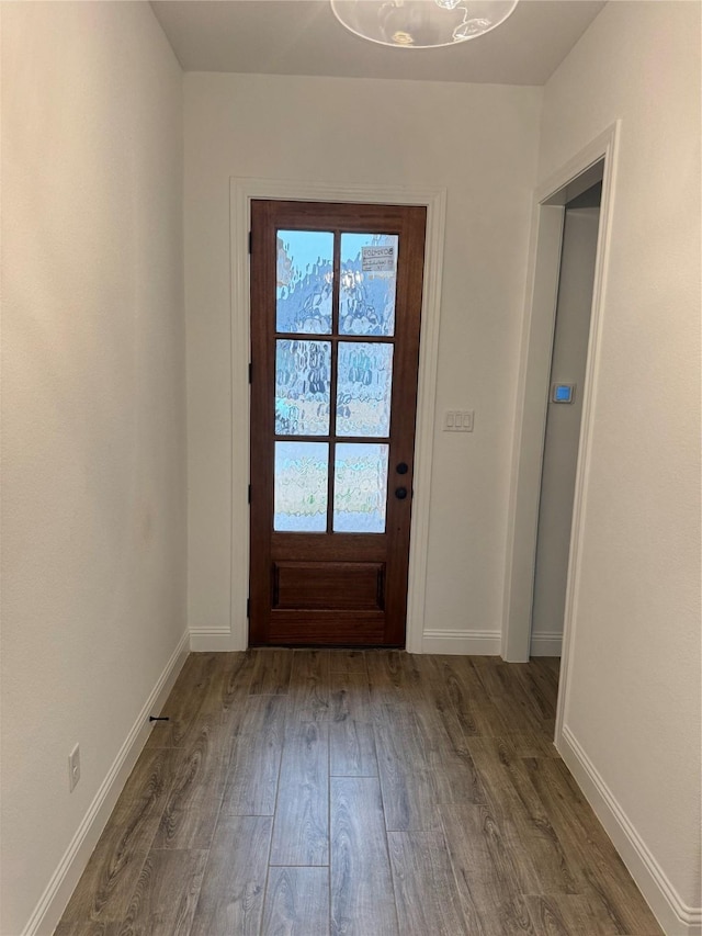 doorway featuring dark hardwood / wood-style flooring