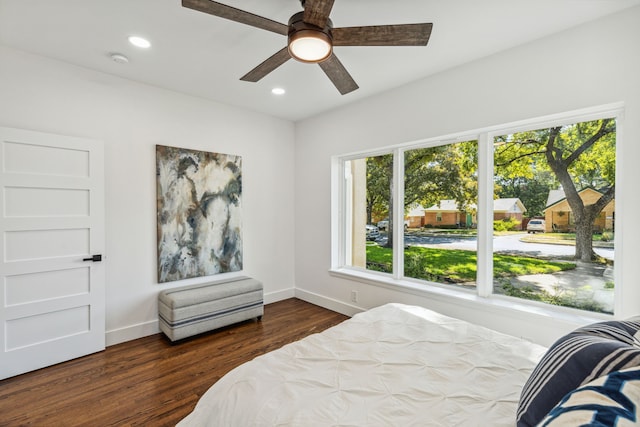 bedroom featuring dark hardwood / wood-style floors and ceiling fan