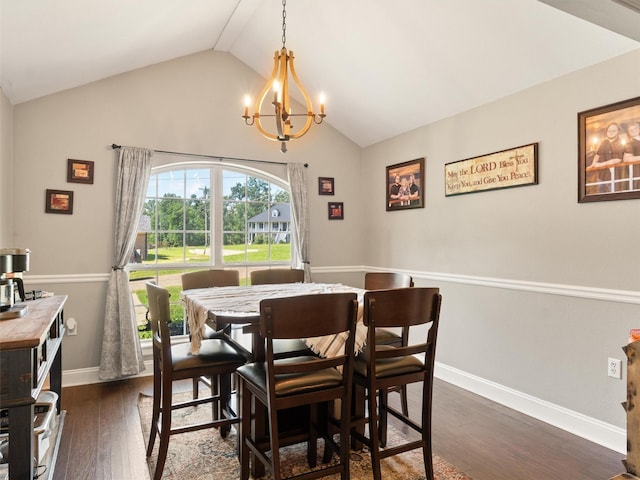 dining area featuring dark hardwood / wood-style flooring, a notable chandelier, and vaulted ceiling