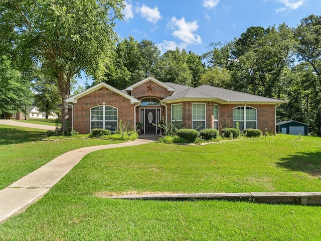 single story home with a front yard