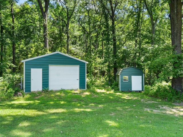 garage with a yard