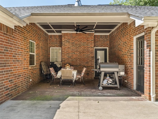 view of patio featuring a grill and ceiling fan