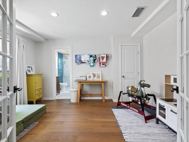 interior space featuring french doors and hardwood / wood-style floors