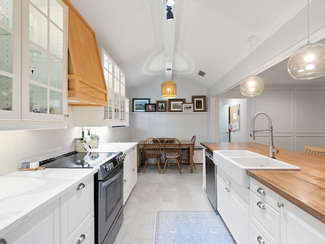 kitchen featuring hanging light fixtures, black dishwasher, stainless steel electric stove, and white cabinets