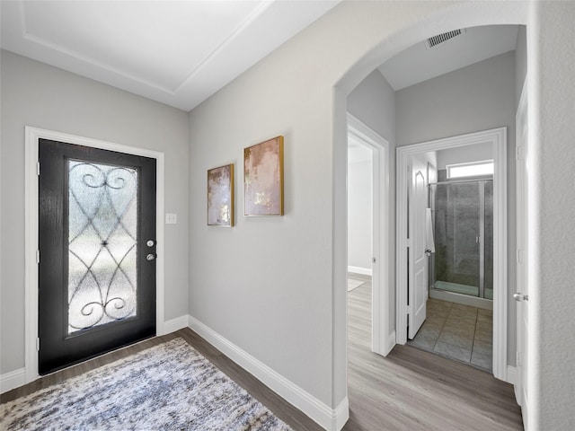 entrance foyer featuring hardwood / wood-style floors