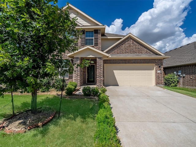 view of front of property with a garage and a front yard