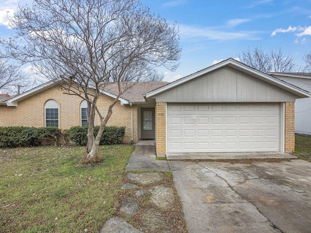 single story home with a garage and a front yard