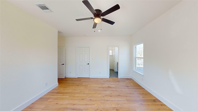 unfurnished room featuring ceiling fan and light hardwood / wood-style flooring