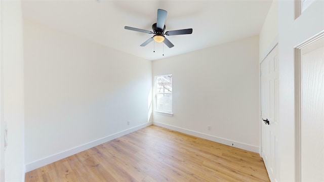 unfurnished room featuring ceiling fan and light hardwood / wood-style flooring