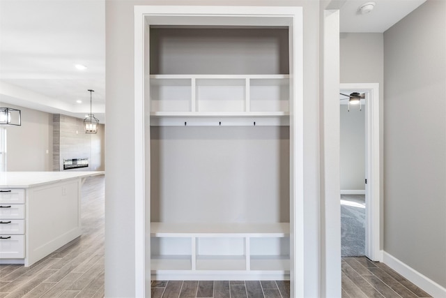 mudroom featuring ceiling fan