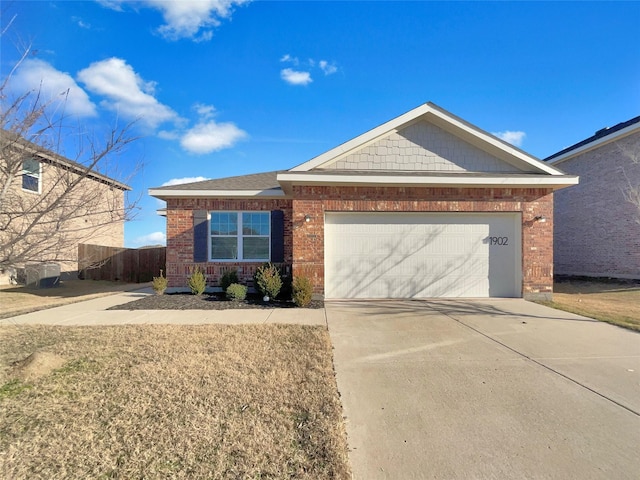 single story home featuring a garage