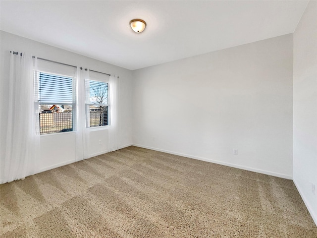 view of carpeted spare room