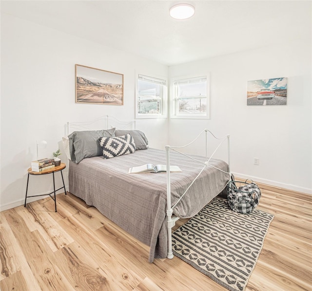 bedroom featuring hardwood / wood-style floors