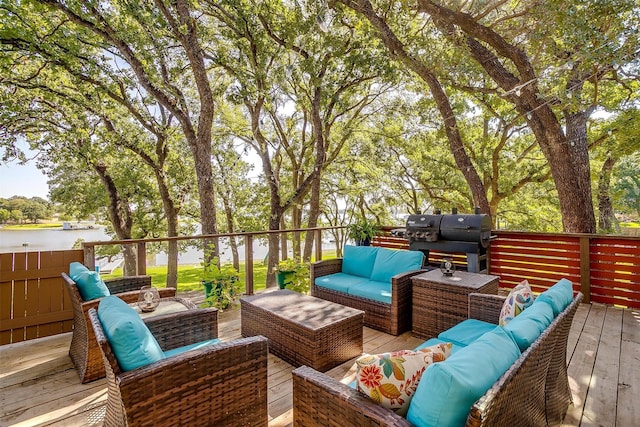 wooden deck featuring outdoor lounge area and grilling area