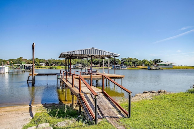 dock area with a water view