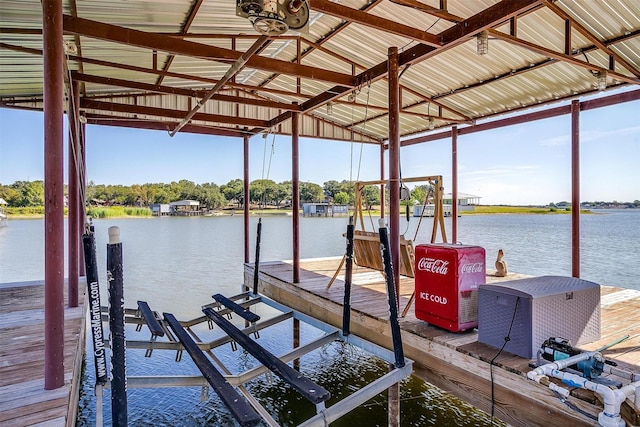 dock area featuring a water view