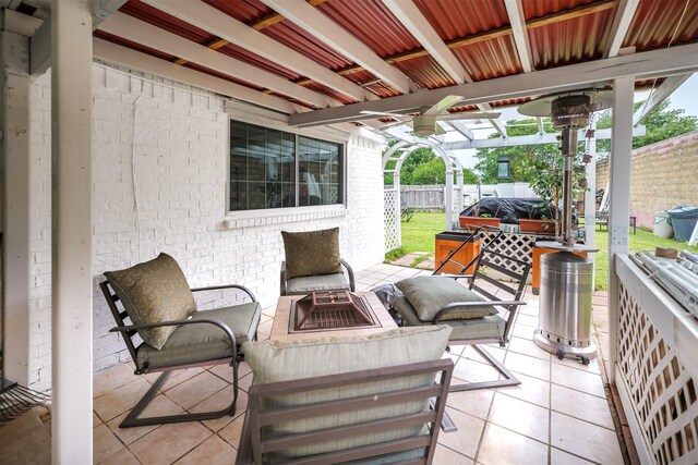 3029 Meadow Creek Ct, Grand Prairie, TX 75052 - view of patio featuring a fire pit, fence, ceiling fan, and a jacuzzi
