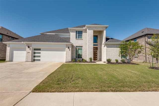 prairie-style home with a garage and a front yard