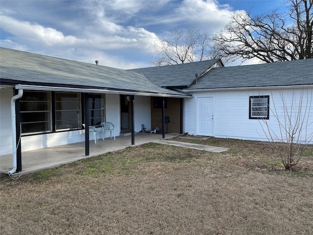 exterior space with a yard and a patio area