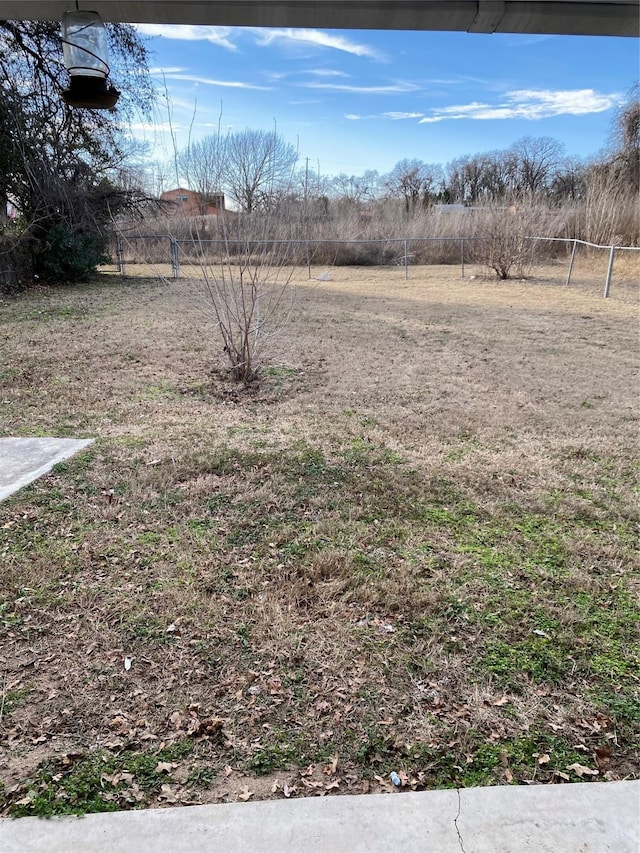 view of yard with a rural view