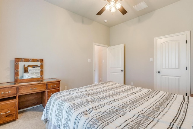 bedroom with light colored carpet and ceiling fan