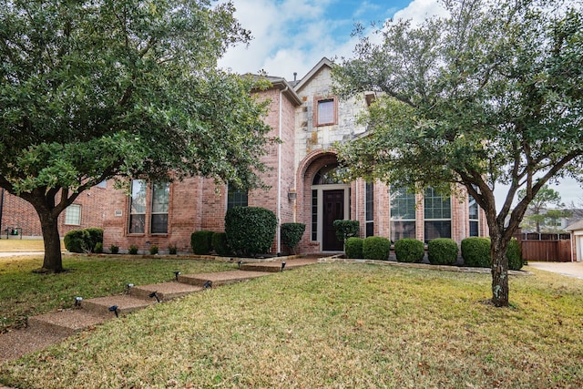 view of front facade with a front yard