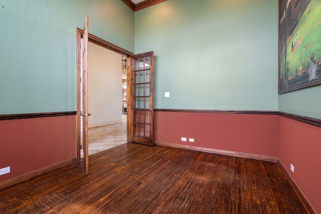 empty room with hardwood / wood-style flooring