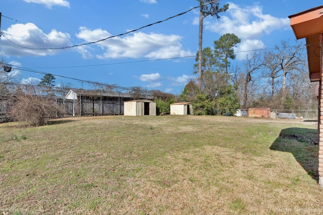 view of yard with a storage unit