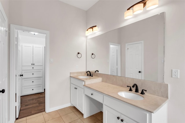 bathroom featuring vanity and tile patterned floors