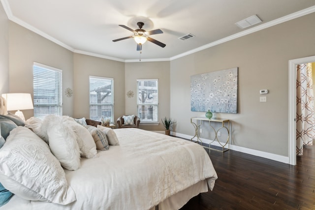 bedroom with crown molding, dark wood-type flooring, and ceiling fan