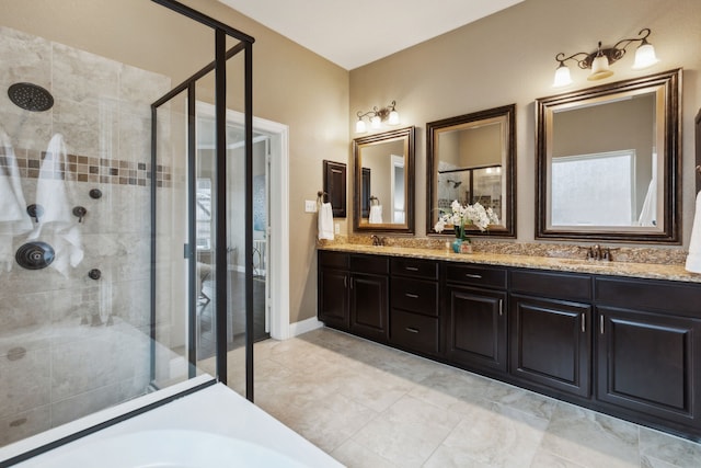 bathroom featuring vanity and walk in shower