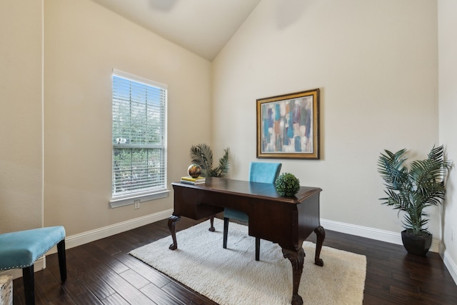 office with lofted ceiling and dark hardwood / wood-style flooring