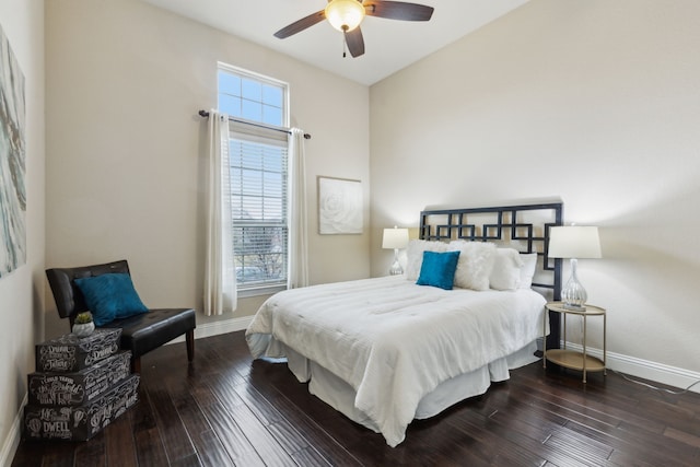 bedroom featuring dark wood-type flooring and ceiling fan