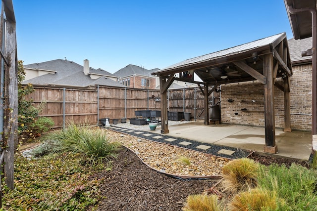 view of yard featuring a gazebo, a patio, and ceiling fan