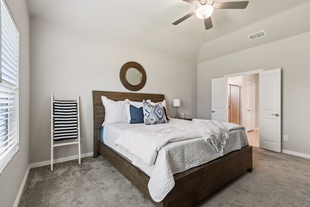 carpeted bedroom with lofted ceiling and ceiling fan