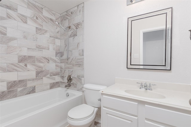 full bathroom featuring toilet, bathing tub / shower combination, and vanity